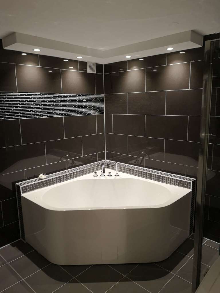 Image of a bathroom with a bathtub
