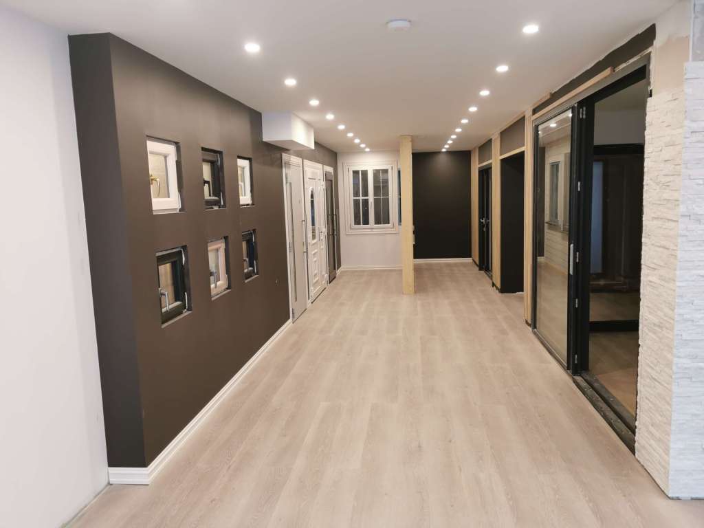 Image of a showroom with windows and doors