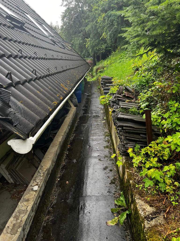 Image from behind a house ready for waterproofing with liquid membrane
