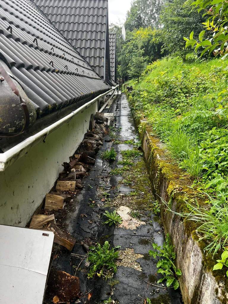 Image from behind a house ready for waterproofing with liquid membrane